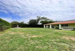 Foto de inmueble en CarreteraAlpuyeca Tequesquitengo, Col. Benito Juárez C.P. 62663, Puente de Ixtla