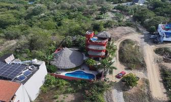 Foto de inmueble en Carretera Escénica Playa las Gatas, Col. La Ropa C.P. 40895, Zihuatanejo de Azueta