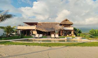Foto de inmueble en C. Delfines, Supermanzana Palmarito, Puerto Escondido, Oaxaca, Col. Bajos de Chila C.P. 71996, San Pedro Mixtepec -Dto. 22 -