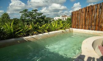 Foto de inmueble en LOTE 13 , MZA 1, CONDOMINIO MAESTRO “ALDEA MAYA” ,LOTE 001 MZA 25 SMZNA 003 DEPARTAMENTO E2, Col. Aldea Zama C.P. 77760, Tulum