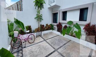 Foto de inmueble en Edificio de Departamentos en Venta  en Playa del Carmen  Colonia Centro, Col. Playa del Carmen Centro C.P. 77710, Solidaridad