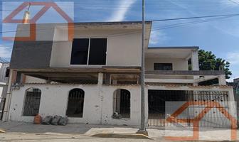 Foto de inmueble en Venta Casa Dividida en dos Niveles en Col. Revolución Verde de Cd. Madero #107, Col. Revolución Verde C.P. 89518, Ciudad Madero