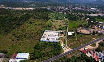 Foto de inmueble en Carretera Acapulco - Zihuatanejo, Col. Bajos del Ejido C.P. 40985, Coyuca de Benítez