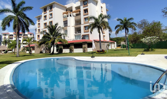 Foto de inmueble en El Table, Av. Antonio Enríquez Savignac, Col. Zona Hotelera C.P. 77500, Benito Juárez