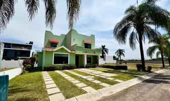 Foto de inmueble en CTRA CAJITITLÁN, Av. Tres Reyes Manzana K2, Fraccionamiento Tres Reyes, 45670 Cuexcomatitlán, Jal., Col. Tres Reyes C.P. 45670, Tlajomulco de Zúñiga