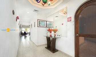 Foto de inmueble en  , Col. Puerto Aventuras C.P. 77733, Solidaridad