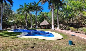 Foto de inmueble en  , Col. Puerto Morelos C.P. 77580, Puerto Morelos
