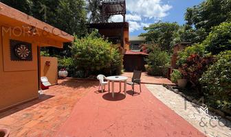 Foto de inmueble en  , Col. Puerto Morelos C.P. 77580, Puerto Morelos