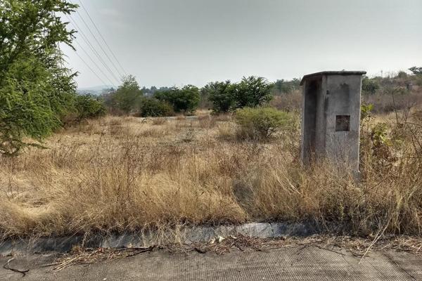 Foto de inmueble en Autopista Mexico-Acapulco, Cto. Sta. Fe km. 112-5, 62794 Santa Fe, Mor. #km. 112, Col. Vista Santa Fe C.P. 62794, Xochitepec