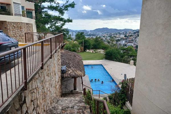 Foto de inmueble en  , Col. Las Cumbres C.P. 39680, Acapulco de Juárez