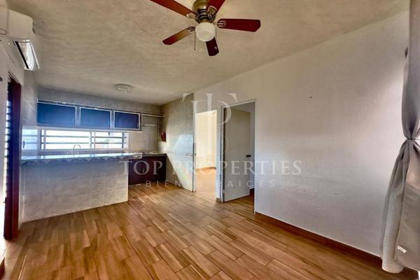 Foto de inmueble en  , Col. Supermanzana 104 C.P. 77539, Benito Juárez